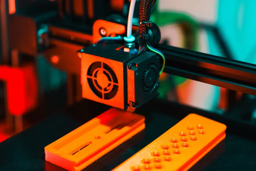 3D printer producing a custom part at the 3DOME Malta studio